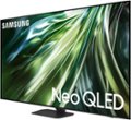 The image features a large Samsung Neo QLED television screen. The screen is bright and colorful, with a green background. The television is positioned in the center of the image, and the screen occupies most of the frame. The Neo QLED technology is known for its high-quality display and advanced features, making it a popular choice for entertainment and gaming enthusiasts.