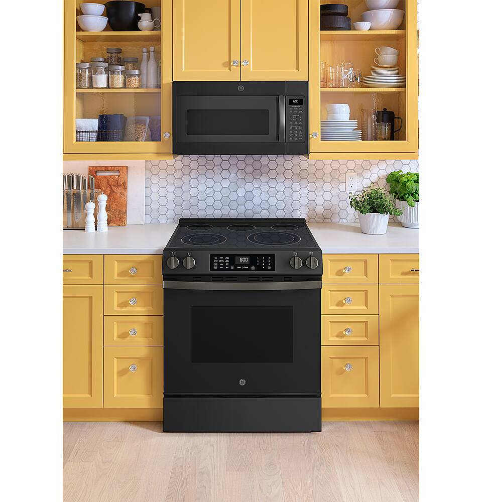 Alt View 28. GE - 5.3 Cu. Ft. Slide-In Electric Convection Range with Steam Cleaning and EasyWash Oven Tray - Black Slate.