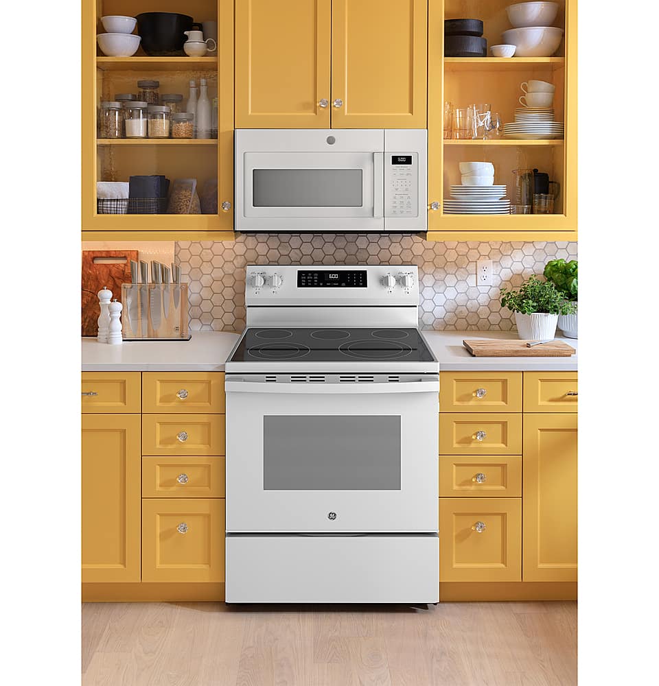 Alt View 28. GE - 5.3 Cu. Ft. Freestanding Electric Convection Range with Steam Cleaning and EasyWash Tray - White.