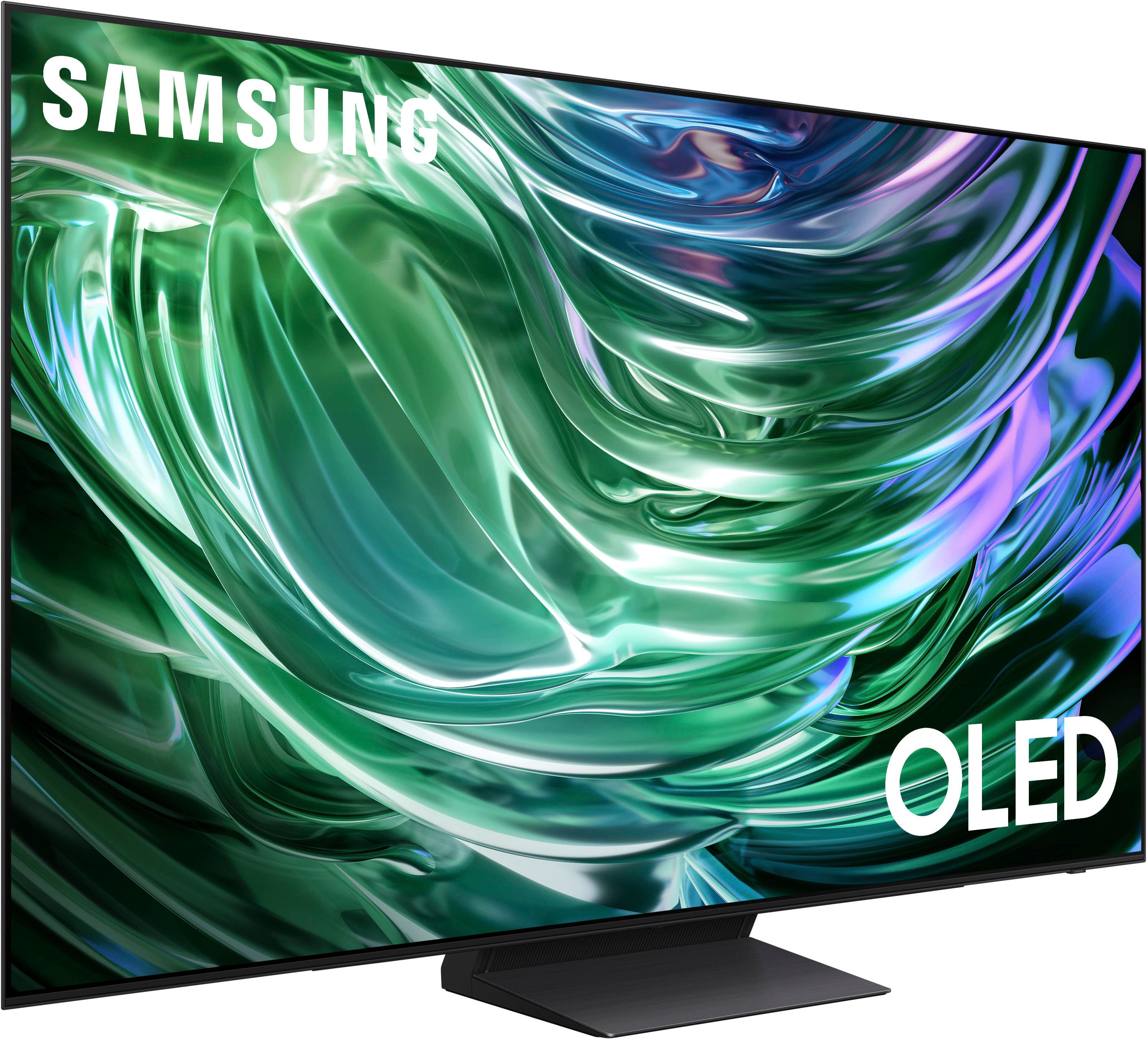 The image features a large Samsung OLED television, which is known for its high-quality display and vibrant colors. The TV is prominently displayed in the image, showcasing its impressive size and resolution. The Samsung OLED TV is a popular choice for those looking for a high-quality entertainment experience at home.