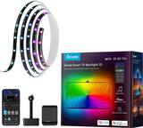 The image features a box of Govee Smart TV Backlight 3S, which is a Wi-Fi enabled LED light designed for use with 55' to 65' TVs. The box also contains a smartphone, a camera, and a remote control. The LED light is designed to enhance the movie-watching atmosphere with just one tap on the Wi-Fi feature. The package also includes a music mode and a color sync feature that works with both Alexa and Google Home.