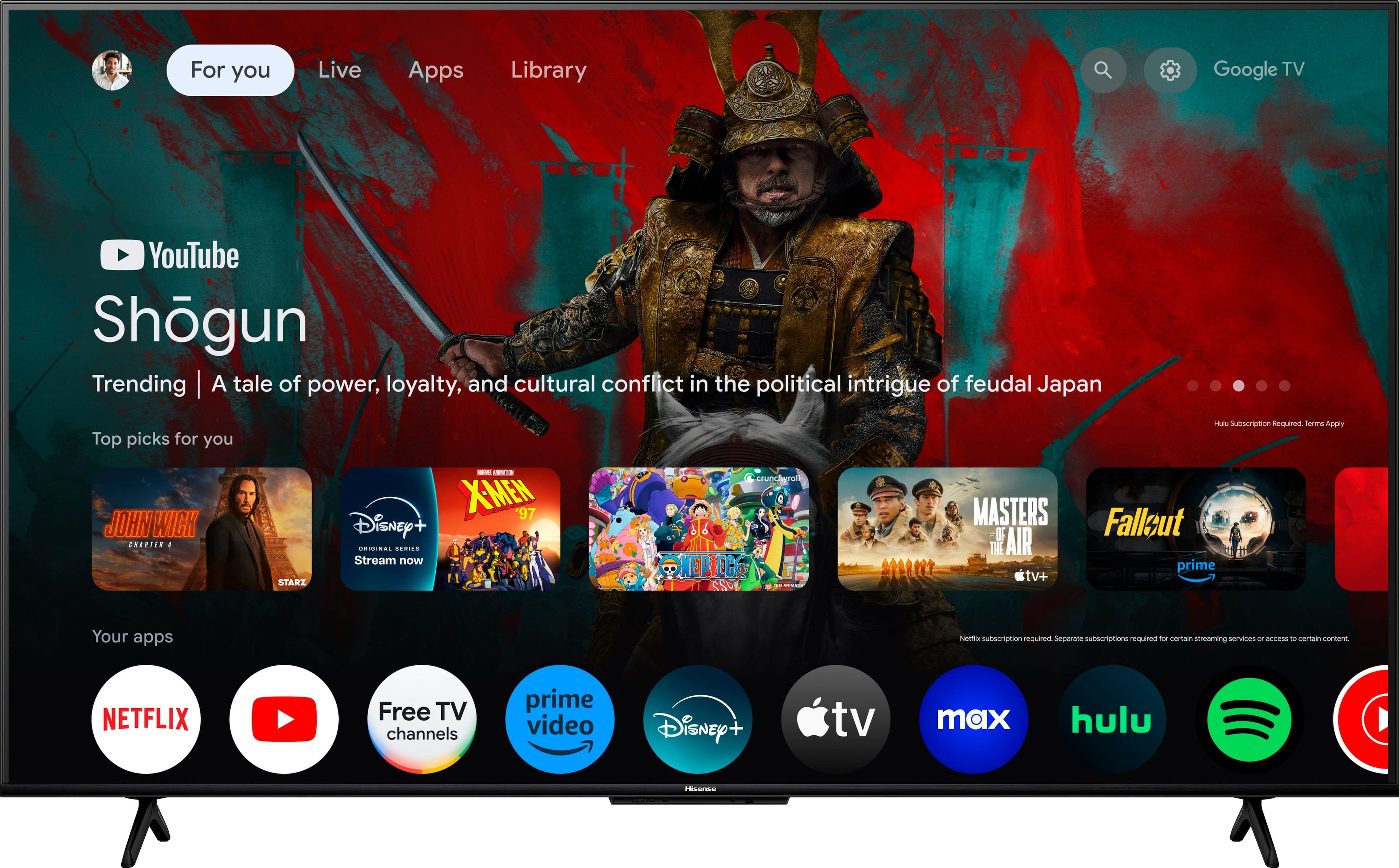 The image features a large flat-screen TV displaying a variety of streaming apps, including YouTube, Google TV, and Netflix. The TV screen also shows a samurai character, possibly from a popular anime or Japanese movie. The TV is placed on a stand, and the apps are arranged in a row across the screen, making it easy for viewers to access and enjoy their favorite content.