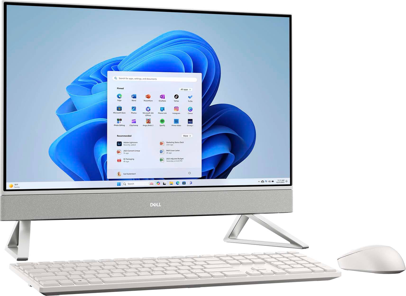 The image features a Dell computer with a monitor and keyboard. The monitor is turned on and displaying a menu. The keyboard is placed in front of the monitor, and a mouse is located to the right of the keyboard. The computer setup is ready for use.