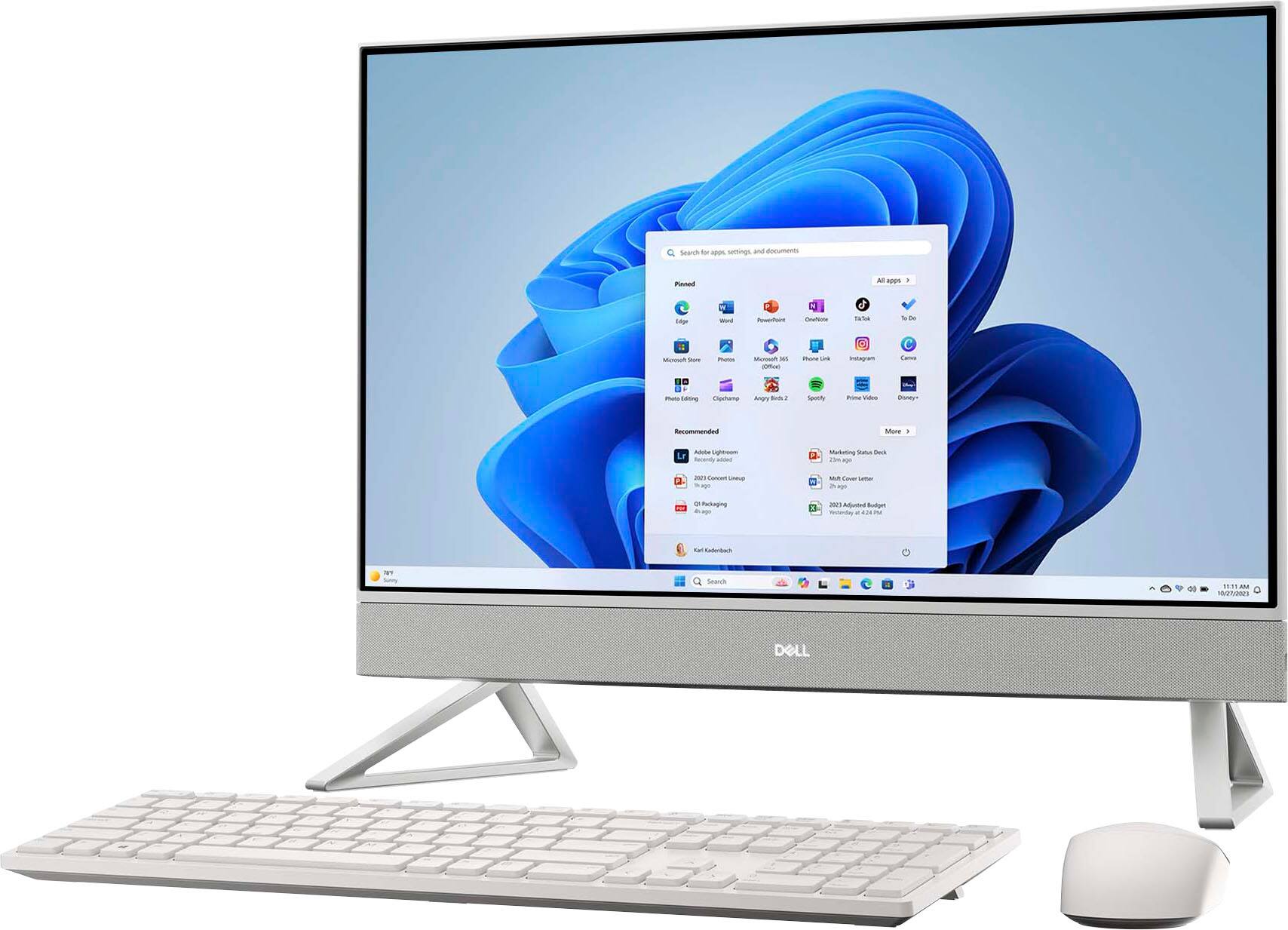 The image features a Dell computer monitor sitting on a desk. The monitor is turned on and displays a menu of icons. The computer is accompanied by a keyboard and a mouse, both placed on the desk in front of the monitor. The scene suggests a typical workstation setup.