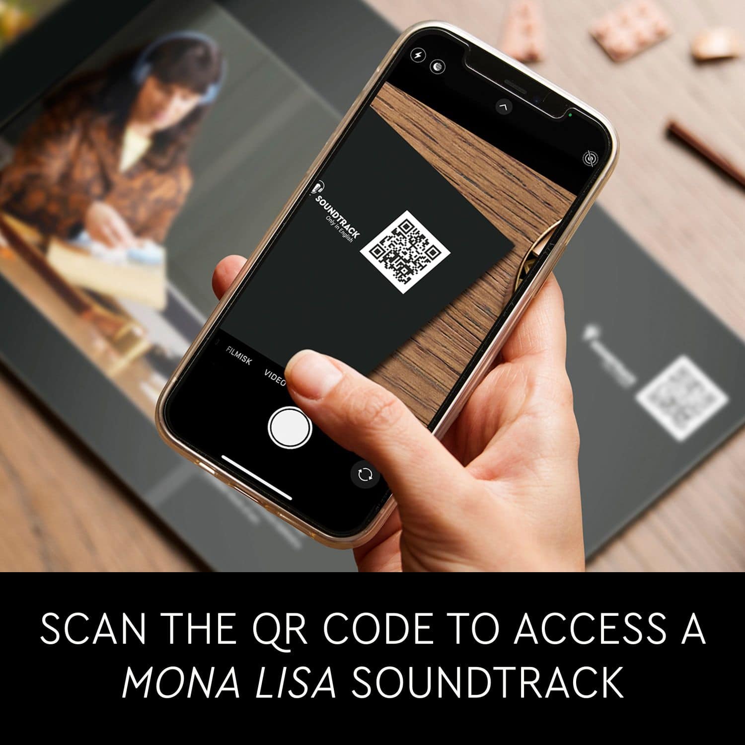 "Scan the QR code to access a Mona Lisa soundtrack."