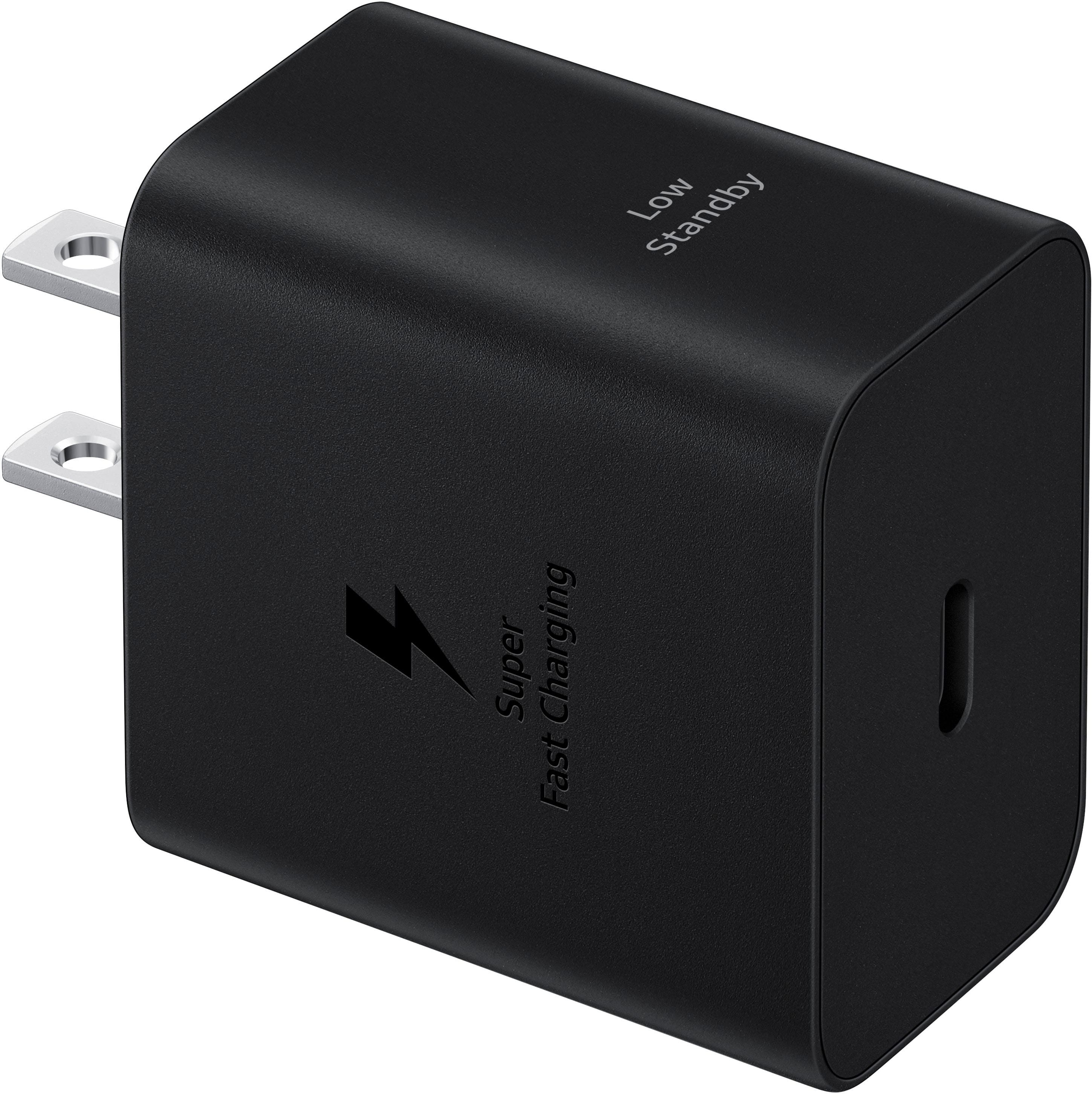 The image features a black power adapter with a USB plug, which is designed for fast charging and low standby power consumption. The adapter is likely used for charging electronic devices such as smartphones, tablets, or other USB-compatible devices.