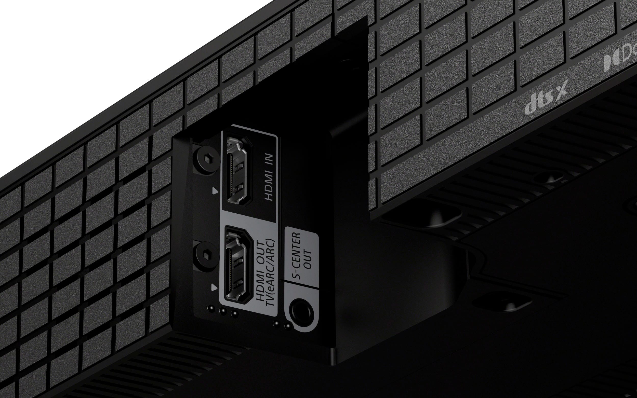 The image features a black electronic device with a DOD dtsx logo on the front. The device has an HDMI out port, which is designed for connecting to a TV or other display. The device also has an HDMI TV (eARC/ARC) port, which enables advanced audio capabilities for a more immersive audio experience. Additionally, there is an S-Center out port, which allows for the connection of a center channel speaker for an enhanced audio setup.