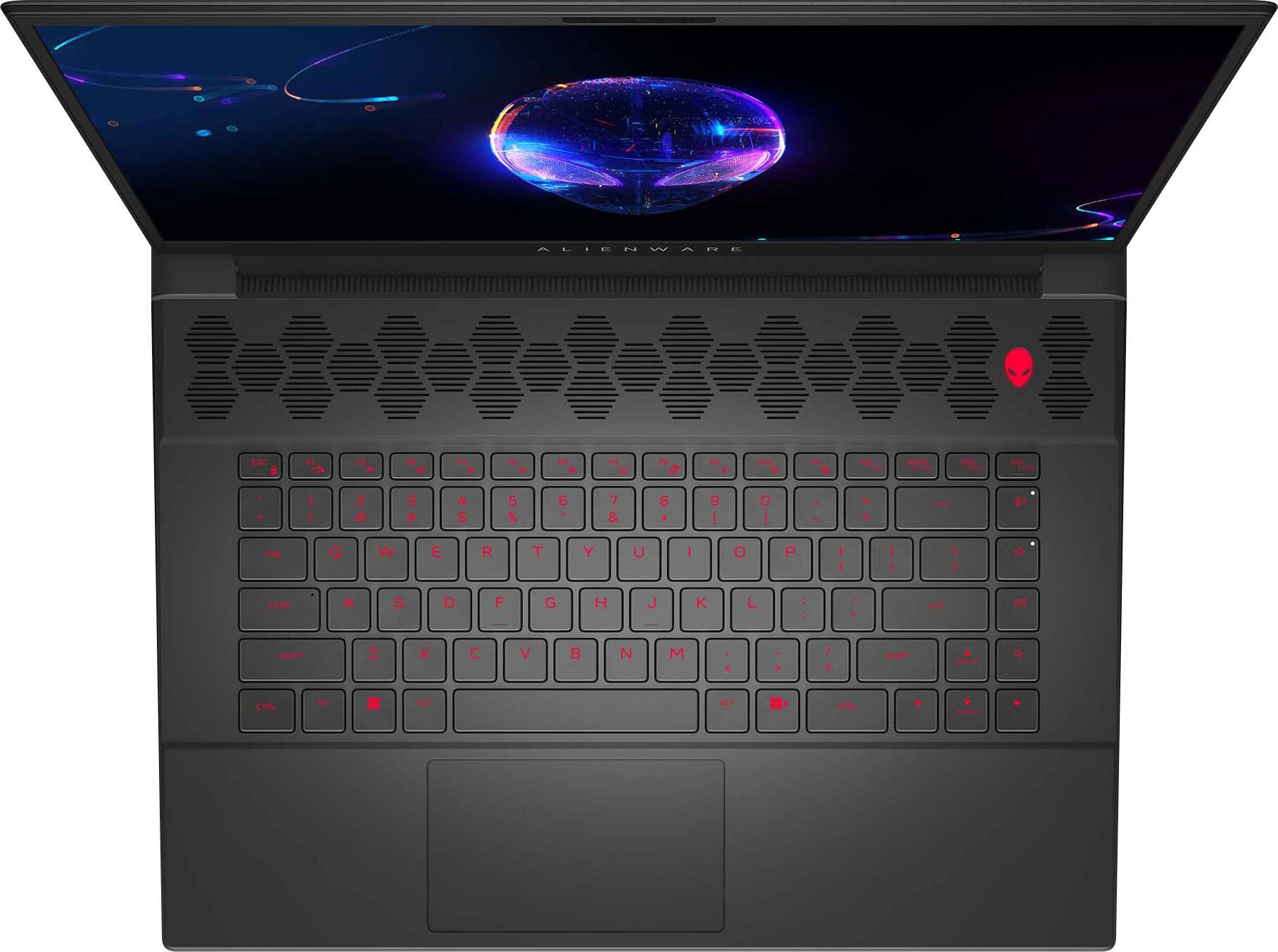 The image features a laptop computer with a black keyboard and a purple background. The keyboard has red letters on the keys, which stand out against the black background. The laptop is open, revealing the keyboard and the screen. The screen displays a purple background with a blue circle in the center.