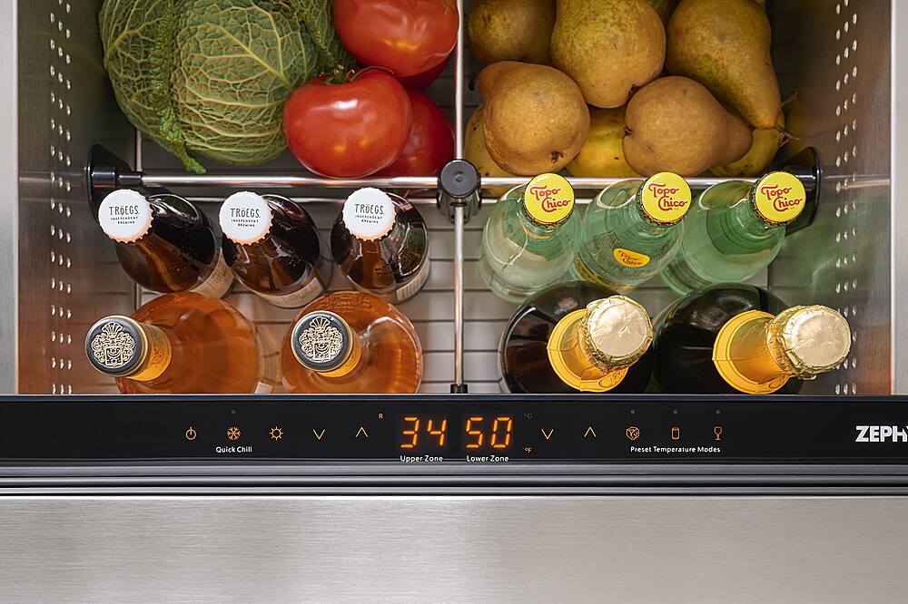 The image features a refrigerator with a drawer containing several bottles of beverages, including wine and soda. The refrigerator has a digital display showing the current temperature of 34.5 degrees Fahrenheit. The bottles are arranged in a way that they are easily accessible and visible.