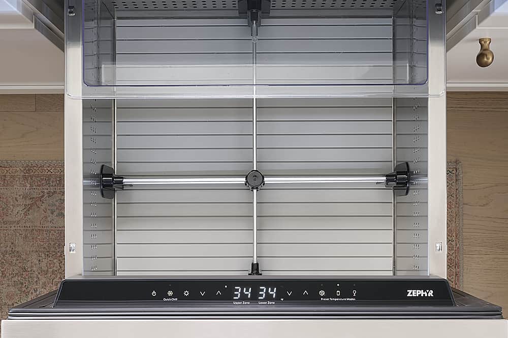 The text on the image is a mixture of numbers, letters, and symbols. It is not possible to group and correct the text without a clear understanding of the context or purpose of the text. It is likely that the text is related to a specific appliance or system, but without more information, it is difficult to provide a meaningful interpretation or correction.