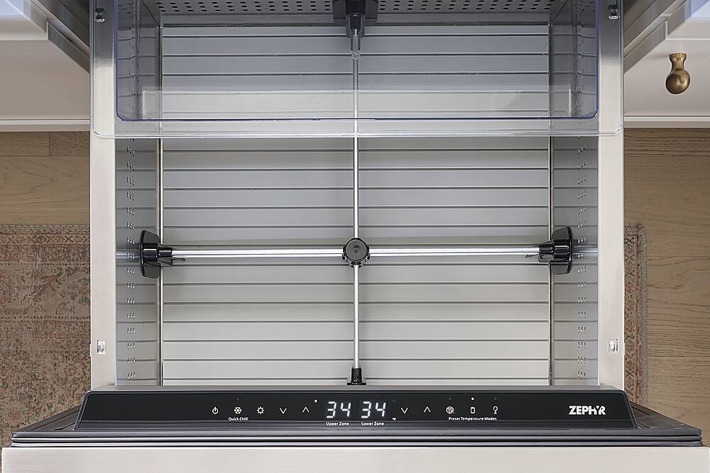 The text on the image is a mixture of numbers, letters, and symbols. It is not possible to group and correct the text without a clear understanding of the context or purpose of the text. It is likely that the text is related to a specific appliance or system, but without more information, it is difficult to provide a meaningful interpretation or correction.