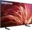 The image features a large Samsung OLED television screen. The screen is prominently displayed, showcasing the high-quality display of the OLED TV. The Samsung logo is visible on the screen, emphasizing the brand's reputation for producing top-notch electronic devices. The television screen is set against a white background, which further highlights the vibrant colors and sharp details of the OLED display.