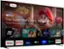 The image features a large flat screen TV displaying various apps and content, including YouTube, Netflix, Disney+, and Spotify. The TV is also showing a movie, specifically "The Super Mario Bros. Movie." The TV screen is filled with different content, making it a one-stop entertainment hub for users.