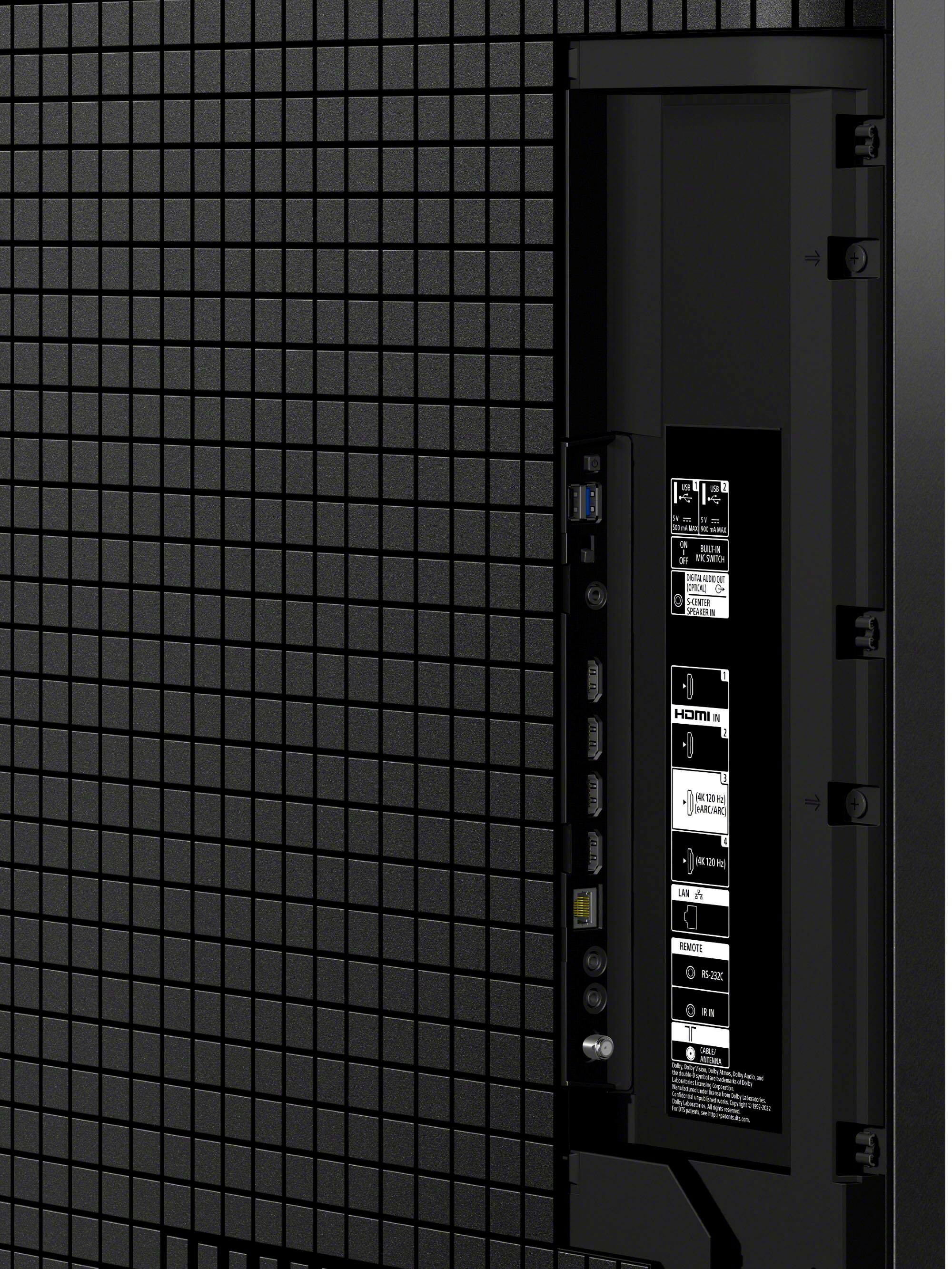 The image features a black object with a white label on it. The label has a lot of text, but the most prominent text reads "120V AC 4120V AC 120V DC 4120V DC." The rest of the text appears to be a mix of numbers and letters, but it is not possible to decipher the meaning without more context.