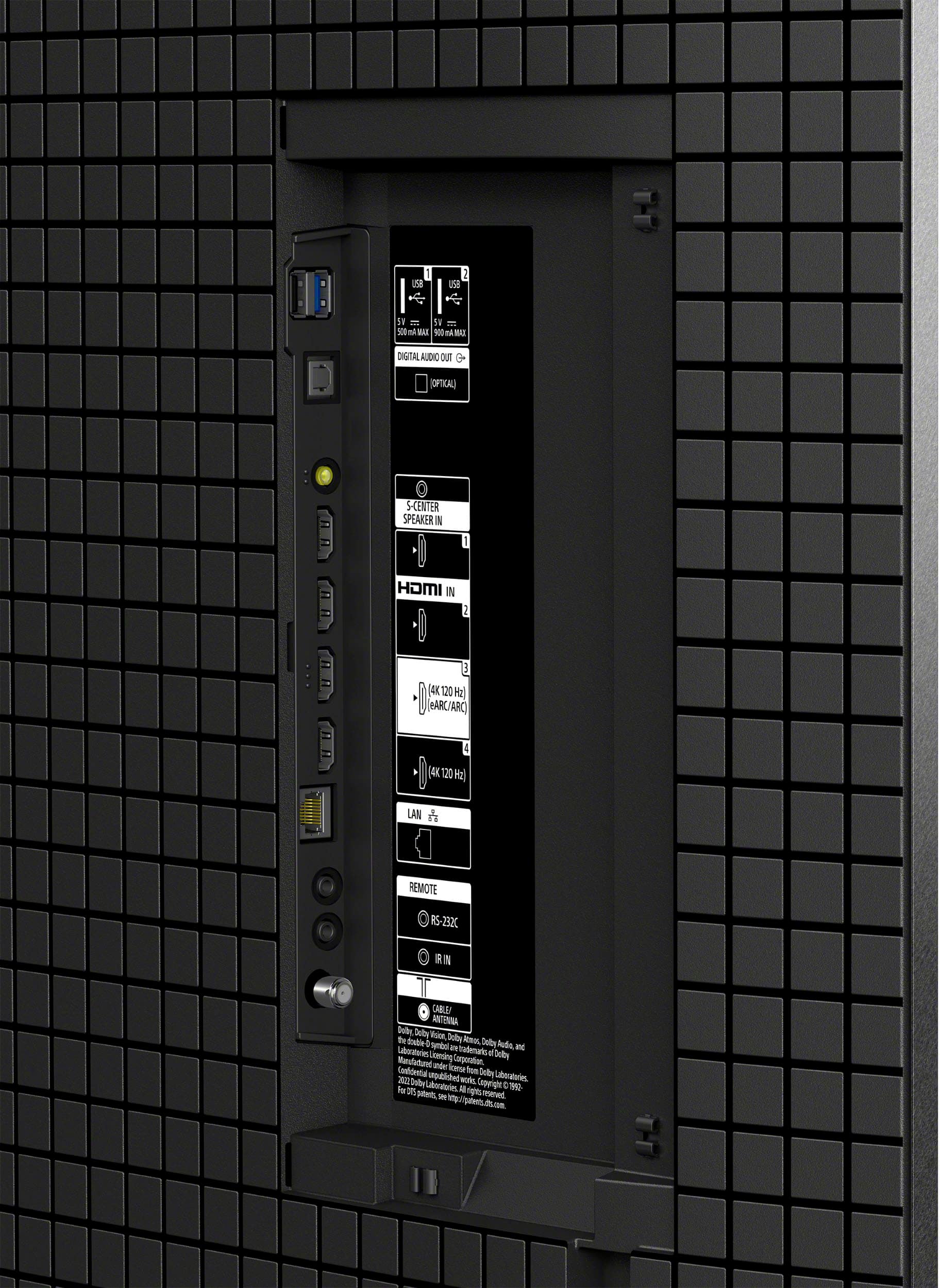 The image features a black box with a display screen on it. The screen is displaying the time and date, which is "12:00" and "01/01/2016." The box is made of black squares and has a white label with information about the device. It is likely that the device is a control panel for a building or a piece of equipment.