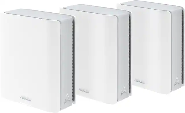 The image features three white Asus routers, each with a slightly different design. They are arranged in a row, with one router on the left, another in the middle, and the third on the right. The routers are placed on a white background, making them stand out prominently.