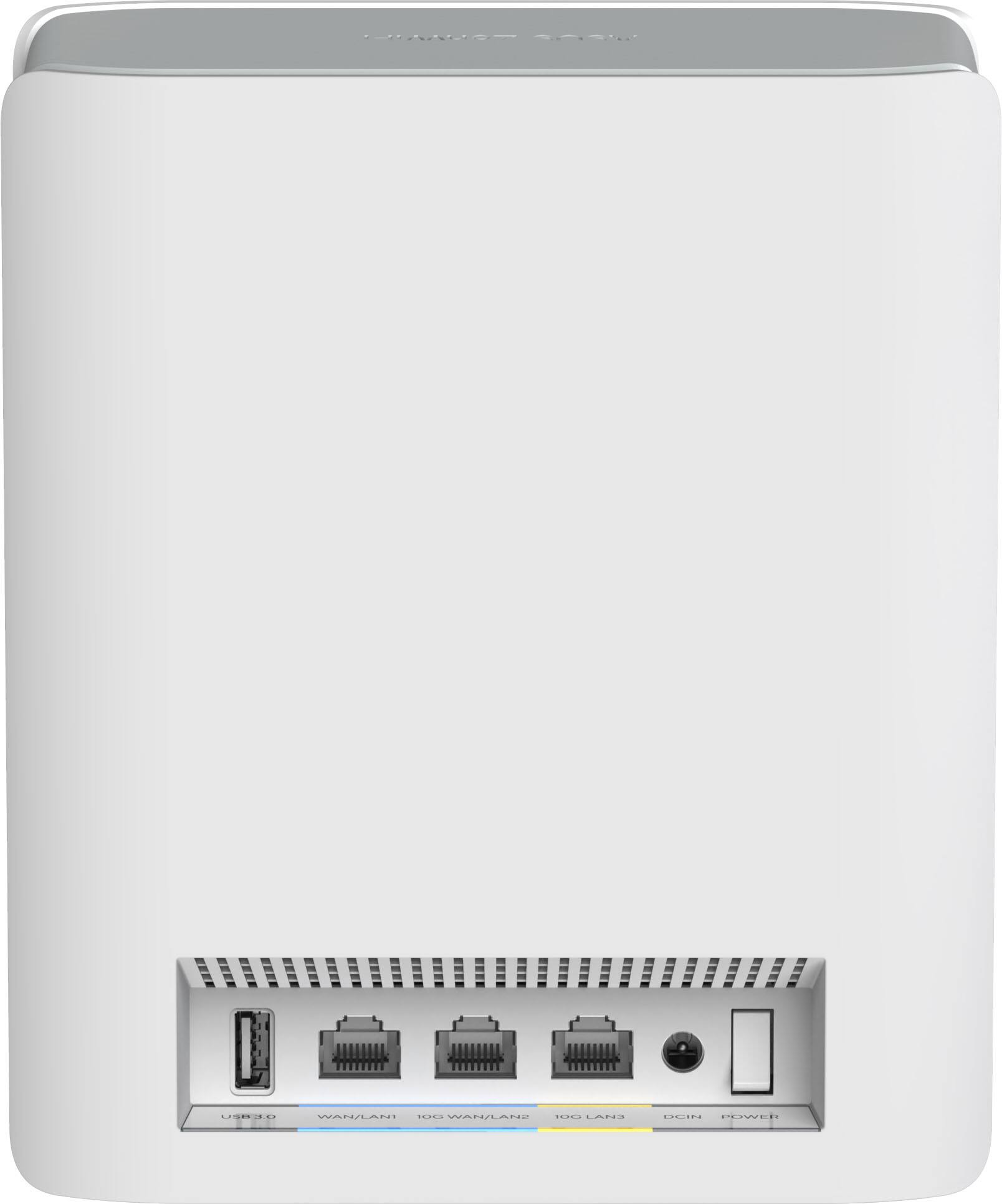 The image features a white box with a USB port and four ports on the back. It appears to be a router or a device with multiple ports for connecting devices. The box is sitting on a table, and the focus is on the back of the device, which has the ports.