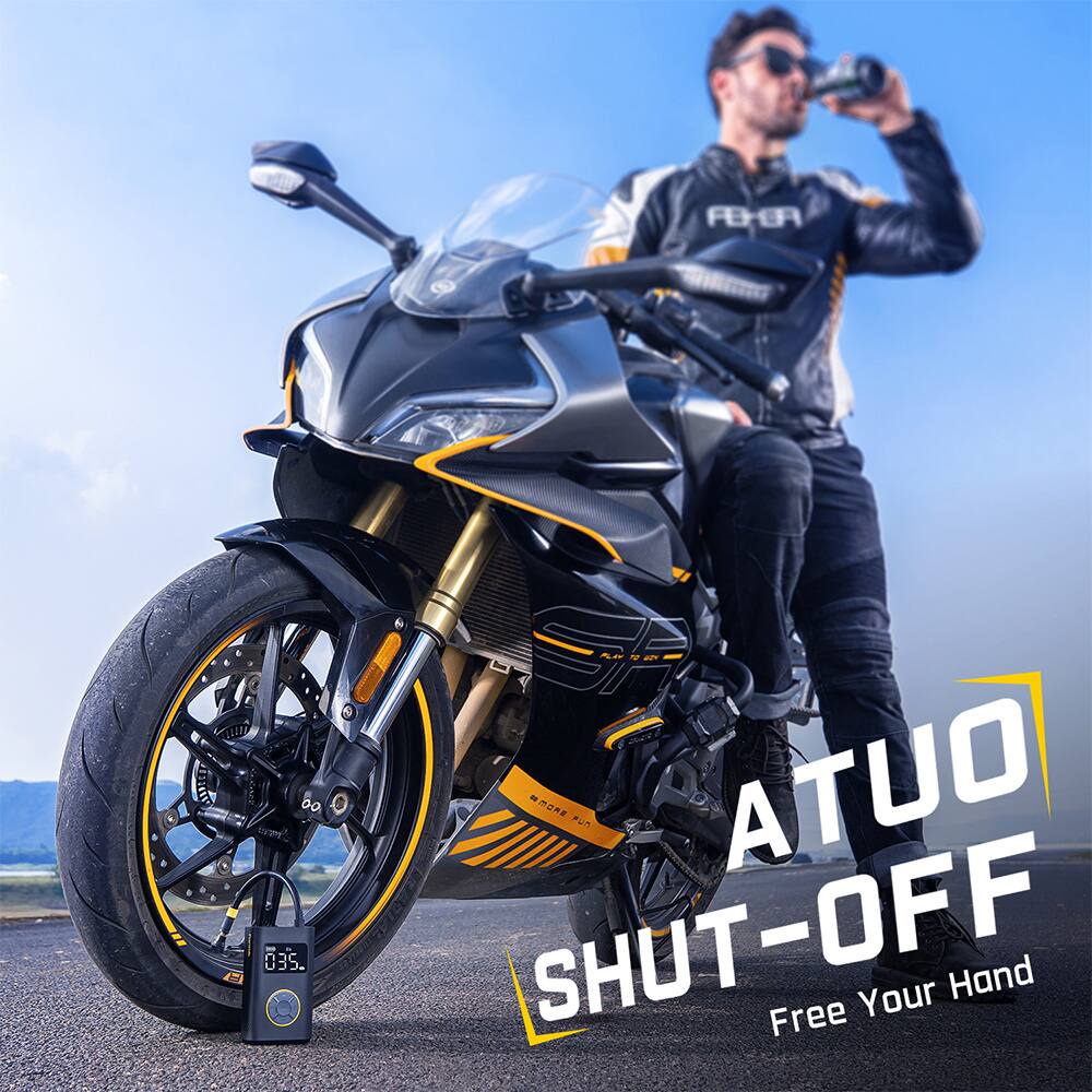 The image features a man standing next to a motorcycle, with the motorcycle taking up a significant portion of the scene. The man is holding a drink in his hand, possibly enjoying a break or preparing for a ride. The motorcycle is prominently displayed, with a close-up view of the front wheel. The scene is likely meant to showcase the motorcycle and the man's interaction with it.