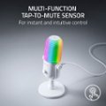 The image features a multi-function tap-to-mute sensor that is designed for instant and intuitive control. The sensor is attached to a microphone, which is placed on a stand. The stand is white and has a rainbow-colored design. The microphone is connected to a wire, and the sensor is placed on top of the microphone. This setup allows for easy and convenient control of the microphone, making it a useful tool for various applications.