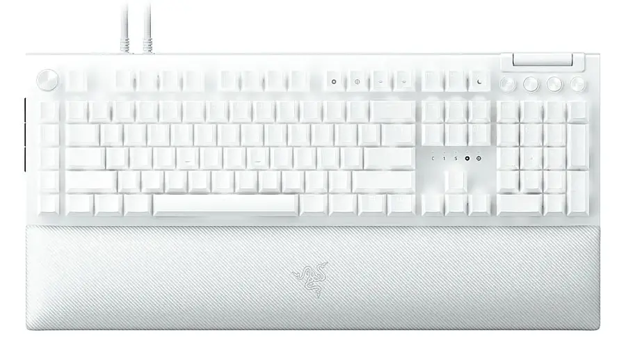 The image features a white keyboard with a black and white design. The keyboard has a black and white color scheme, with white keys and black lettering. The keyboard is in a close-up view, showcasing its design and layout. The keys are arranged in rows, with the letters and numbers visible on the keys. The keyboard is likely a laptop keyboard, as it is designed for use with a laptop computer.
