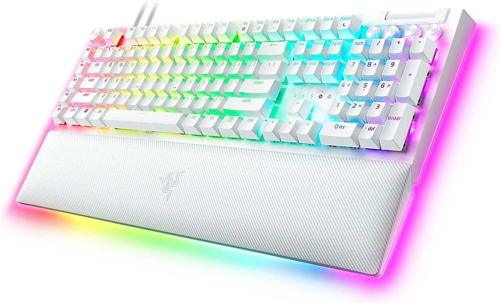 The image features a white and colorful computer keyboard with a rainbow pattern. The keyboard has a variety of keys, including letters, numbers, and function keys. The keys are arranged in rows, with some keys having a combination of letters and numbers. The keyboard is designed to provide an aesthetically pleasing and comfortable typing experience.