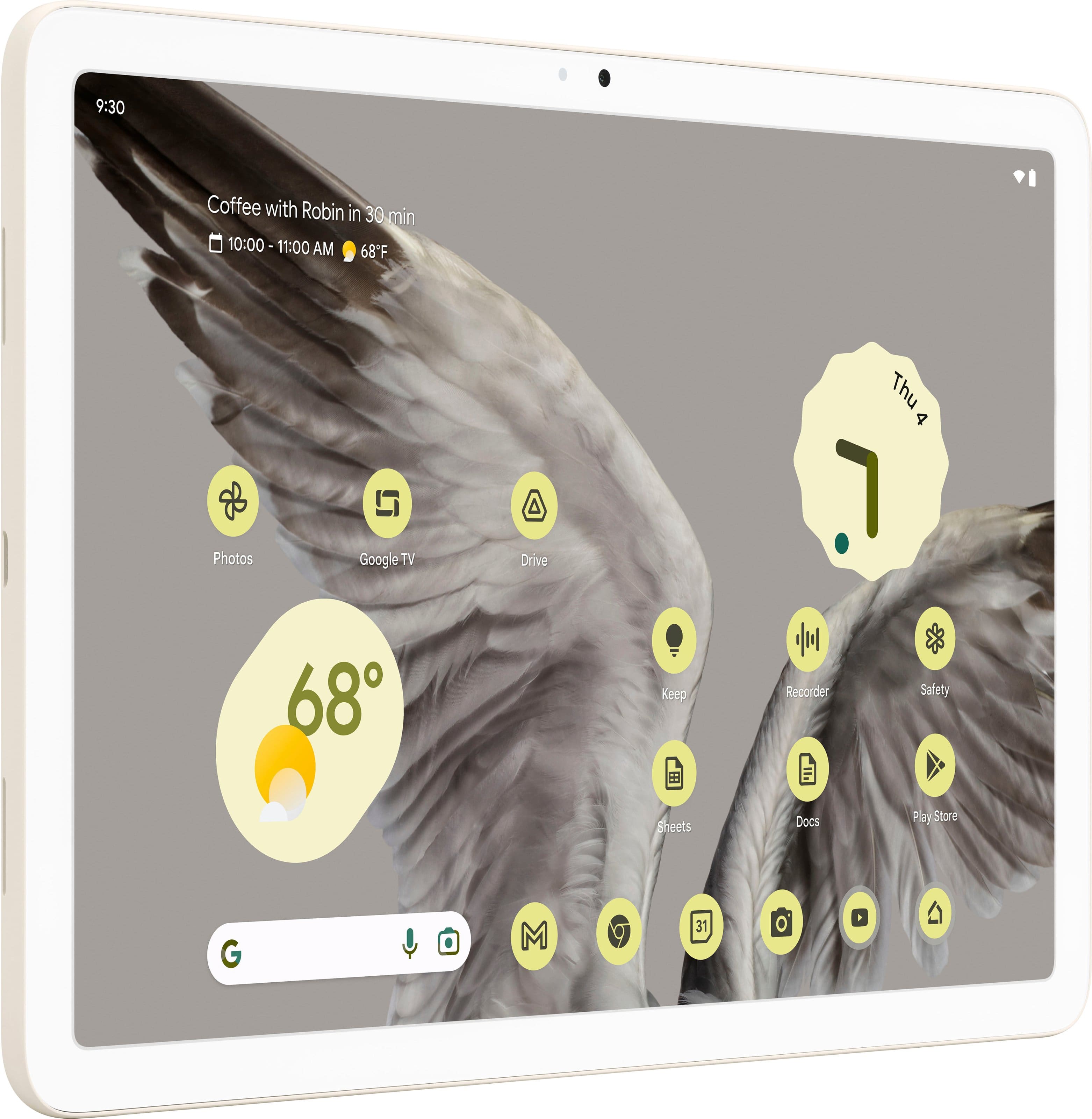 The image features a white tablet with a winged creature on the screen. The time displayed on the screen is 9:30. The tablet is open and appears to be in use.