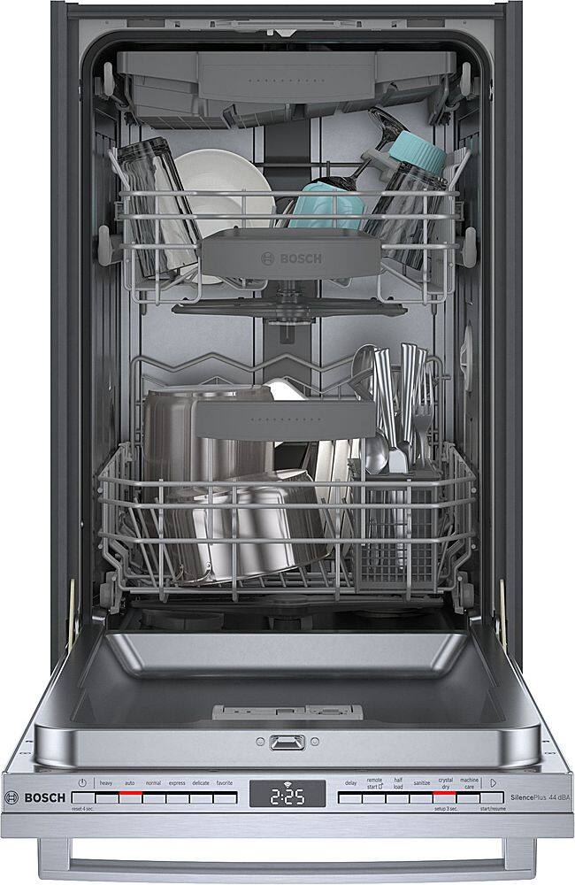 The image features a large, stainless steel dishwasher with a full rack of dishes inside. The dishwasher is equipped with various utensils, including knives, spoons, and forks. The dishes are arranged neatly in the rack, indicating that the dishwasher is ready for use. The presence of multiple utensils and dishes suggests that this dishwasher is designed to handle a variety of cleaning tasks, making it a versatile and convenient appliance for any home.