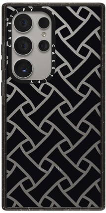The image shows a black and white case with a patterned design, featuring a cell phone. The case is designed to protect the phone and add a stylish touch to the device. The case is made of a durable material that can withstand daily wear and tear. The patterned design adds a unique and eye-catching element to the case, making it stand out from other generic cases. The case is available in various sizes to fit different phone models, ensuring that users can find the perfect fit for their device.