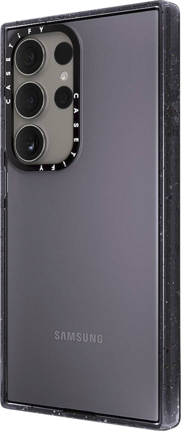 The image features a Samsung phone with a camera lens on the back. The phone is in a vertical position, and the camera lens is prominently visible. The phone is likely a compact or slim model, as it is described as being "skinny" in the image.