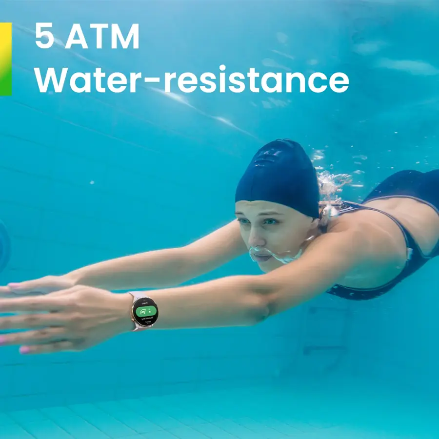 The image features a woman wearing a smart watch while swimming in a pool. The watch is water-resistant, as indicated by the 5 ATM rating. The woman is swimming with her hands outstretched, showcasing her athleticism and the capabilities of the smart watch.