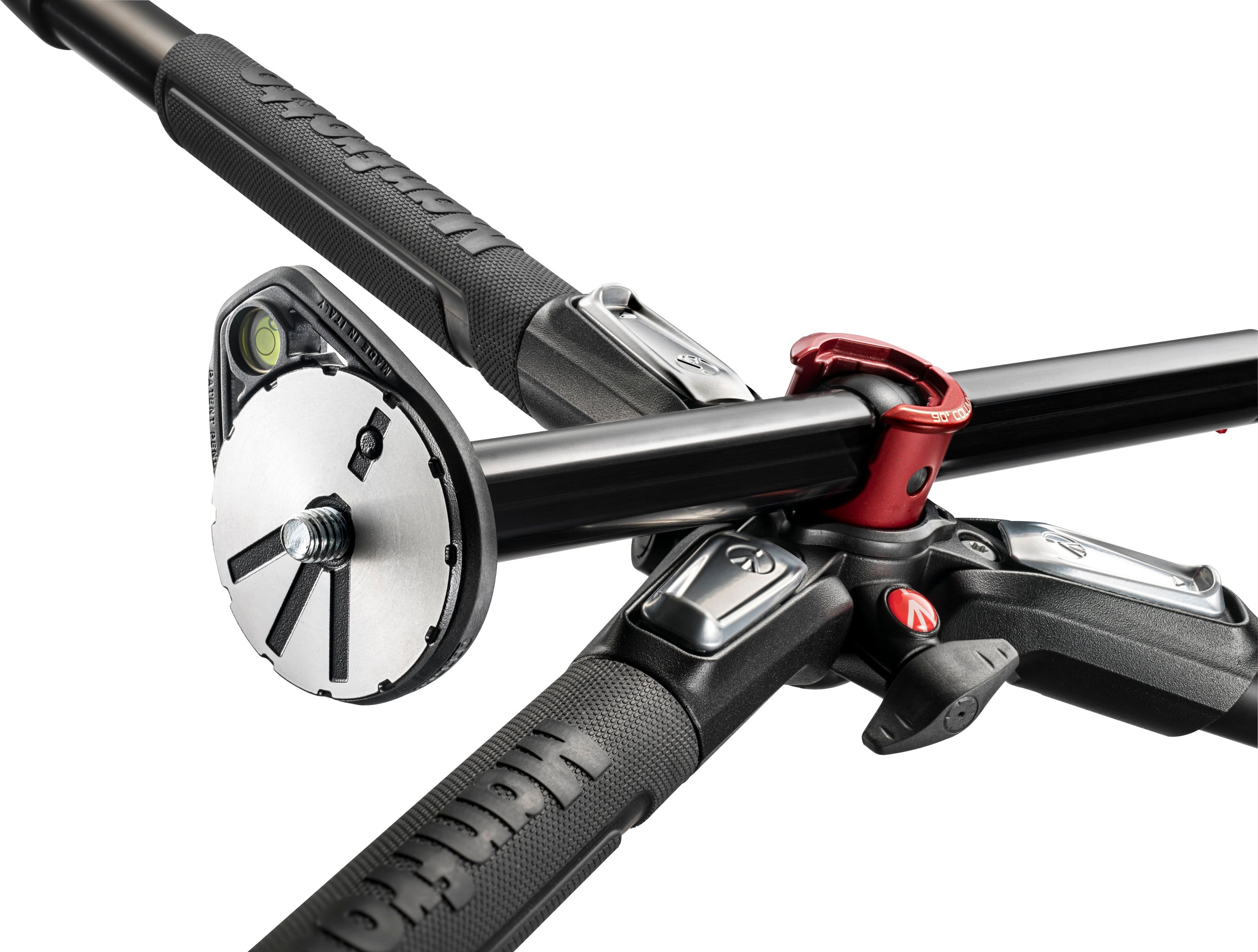 The image features a close-up view of a bicycle's gears and handlebars. The bike has a red and black color scheme, with a red brake lever and a black handlebar. The gears are clearly visible, showcasing the intricate mechanism of the bicycle. The bike appears to be well-maintained and ready for use.