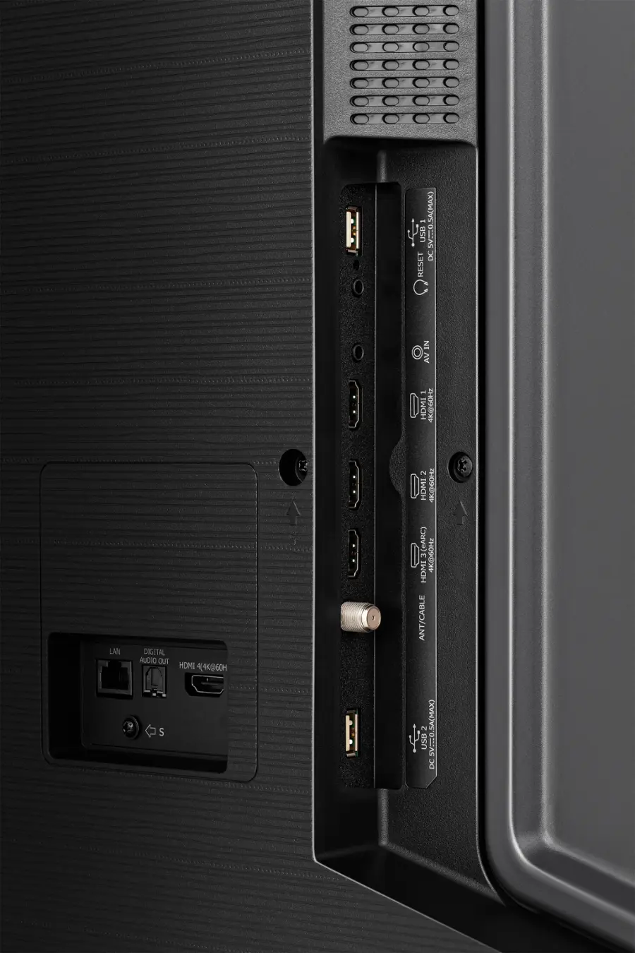 The image features a computer tower with a USB port and a reset button. The USB port is located on the side of the tower, and the reset button is positioned near the top. The tower also has a power button and a digital audio out port. The tower is designed to support 4K resolution at 60Hz, making it suitable for high-quality video and audio output.