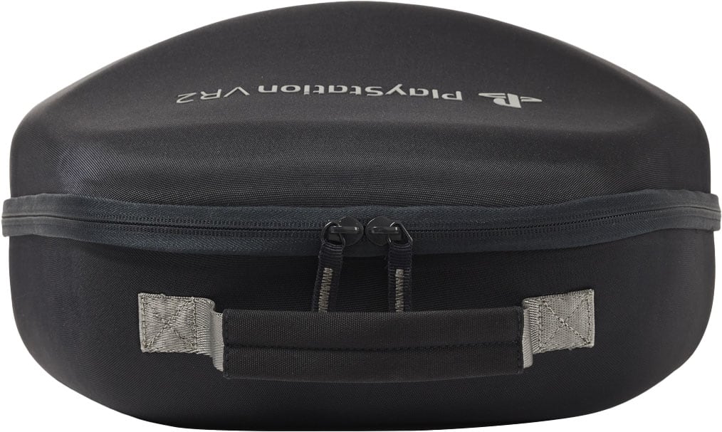 The image features a black and silver PlayStation VR headset, which is a virtual reality gaming device. The headset is sitting on a white background, making it stand out prominently in the scene.