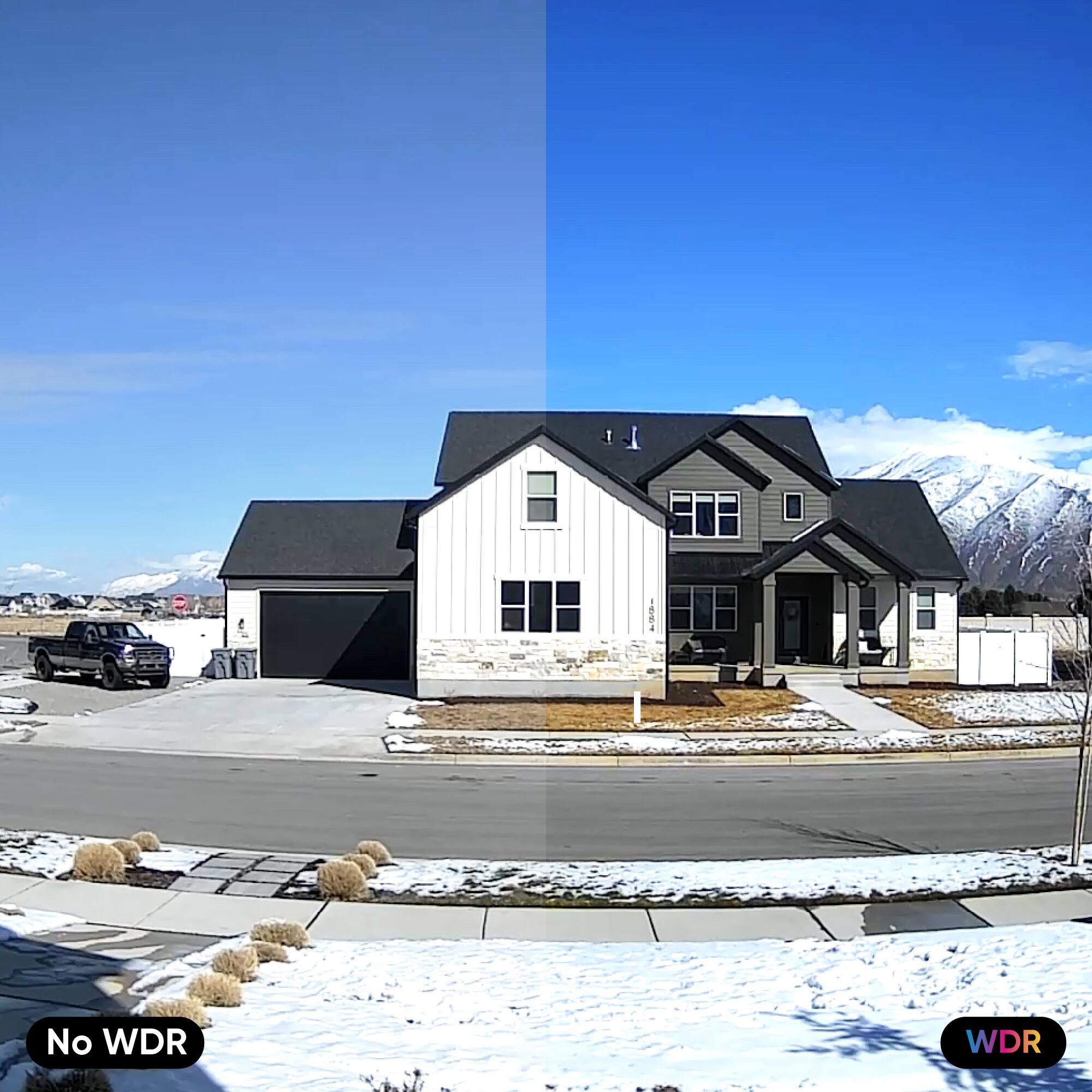 The image shows a large house with a black roof, surrounded by a snowy landscape. The house is situated on a street with a parked truck nearby. The image is divided into two parts, one with a blue sky and the other with a white sky. The house appears to be a two-story structure with a driveway leading up to it.