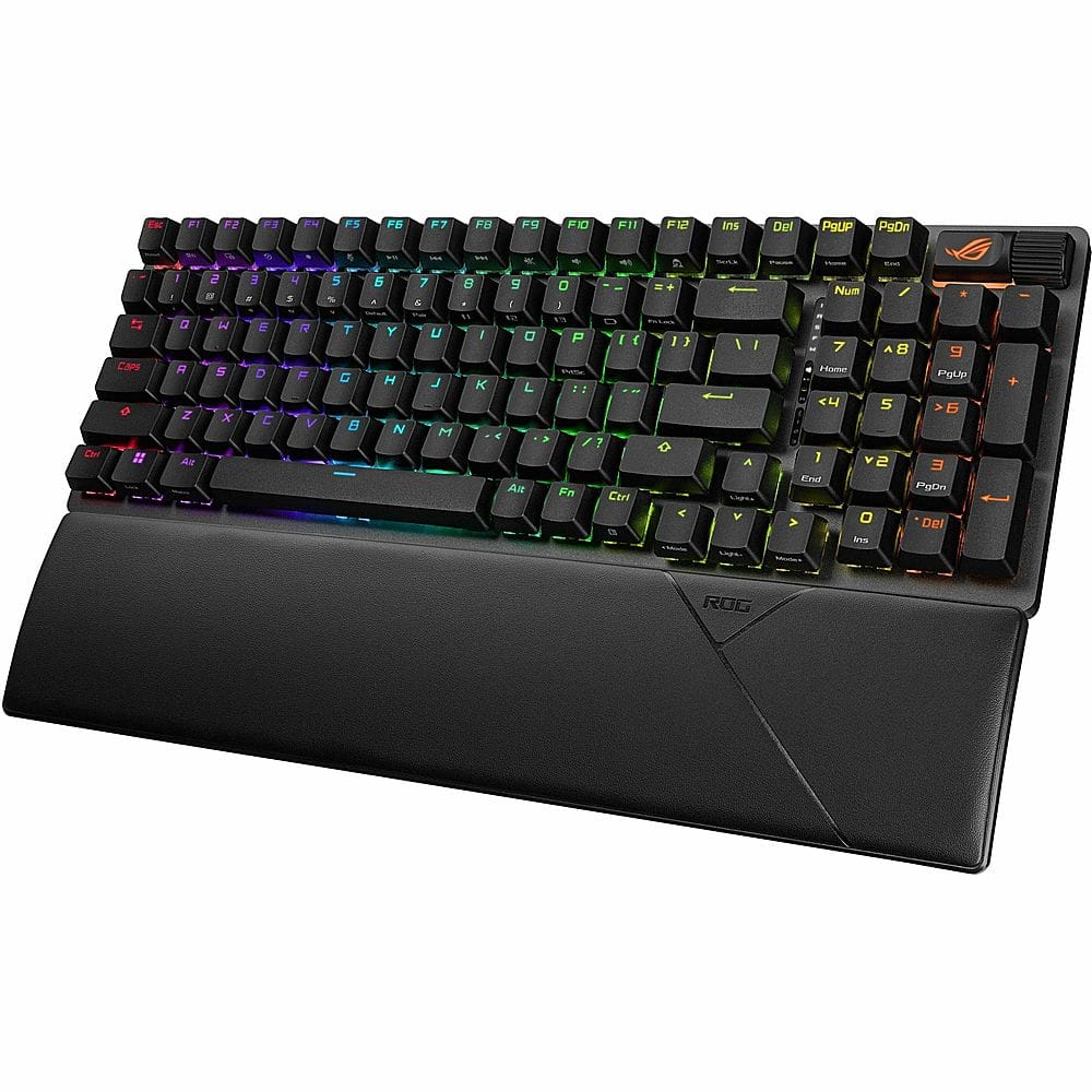 The text on the image is a description of the keyboard, which is a colorful, black, and white keyboard. The keyboard has a rainbow design and features a variety of colors, including red, green, blue, yellow, and orange. The keyboard is an ASUS keyboard, and it has a unique design that sets it apart from other keyboards. The keyboard is designed to be visually appealing and to provide a comfortable typing experience for users.