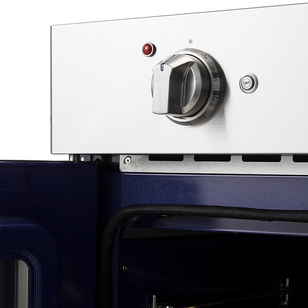 The text on the image reads "S ARM ta D'HYDRATE BAXE . CBAKE x." This text is in French and translates to "S ARM to D'HYDRATE BAXE . CBAKE x." It is not clear what this text is referring to, but it appears to be related to the oven or baking process.