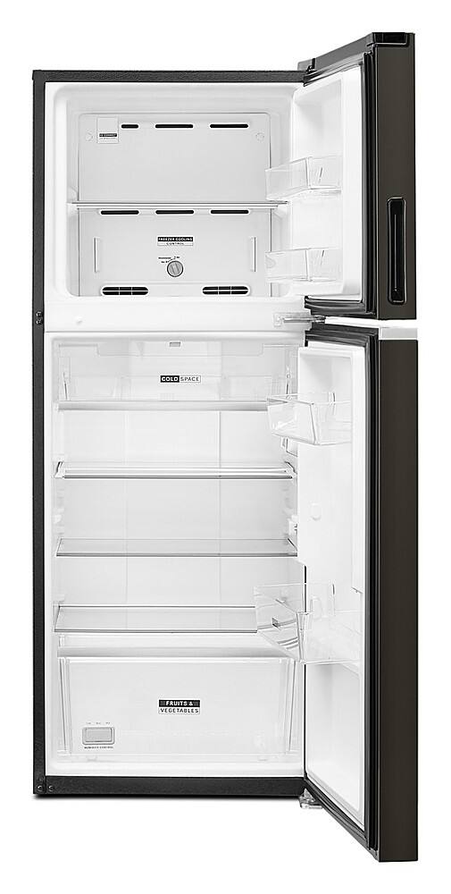 The image shows a black and white refrigerator with the door open, revealing a nearly empty interior. The refrigerator is described as having a lot of cold space, and it is suitable for storing fruits and vegetables.