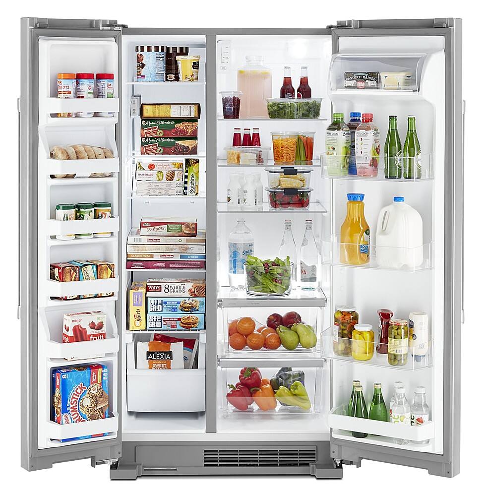 The image shows an open refrigerator filled with various food items and drinks. The refrigerator is stocked with a variety of items such as milk, juice, and other beverages. There are also several bottles of different sizes and shapes, as well as a bowl of fruit. The refrigerator is well-organized, with the items arranged neatly in the shelves and compartments. Overall, the refrigerator appears to be well-stocked and ready for use.