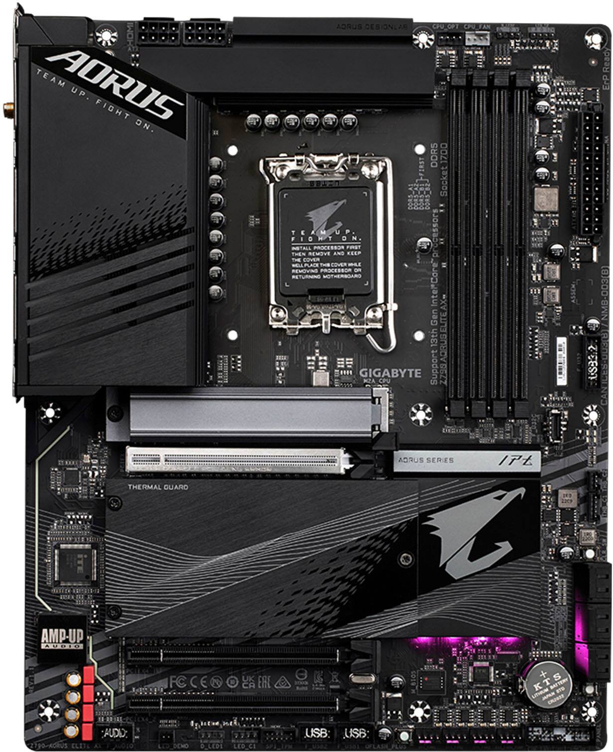 The image features a computer motherboard with a black and purple color scheme. The motherboard is a Gigabyte Aorus model, and it is equipped with a CPU and RAM. The motherboard is designed for high-performance gaming and is compatible with Intel Core i7 processors. The close-up view of the motherboard showcases its intricate details and the various components that make up the system.
