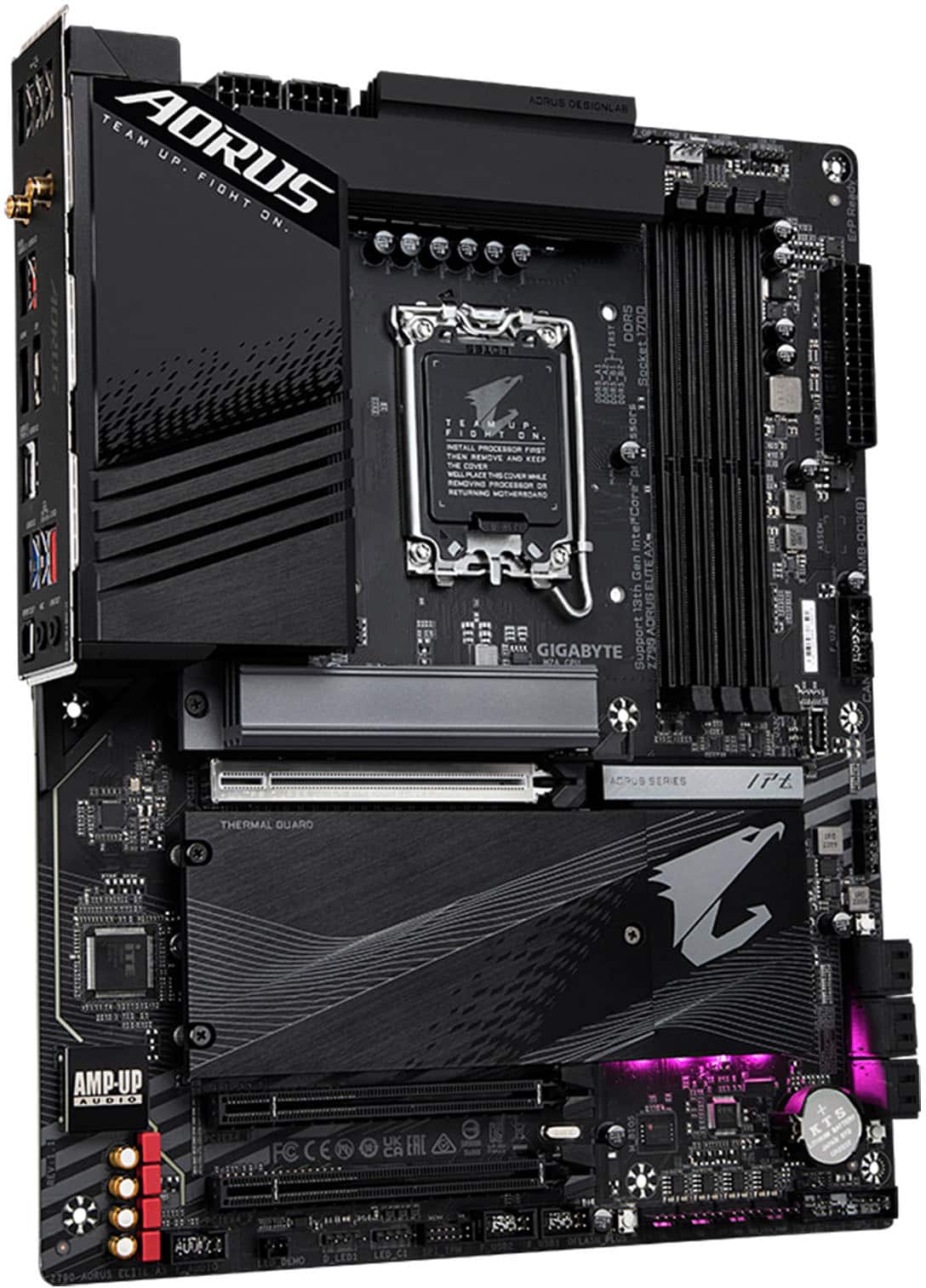 The image features a computer motherboard with a black and purple color scheme. The motherboard is made by Aorus, a sub-brand of Gigabyte. The motherboard is designed for gaming and overclocking, and it is equipped with a variety of ports and connectors. The image showcases the motherboard's backside, highlighting its internal components and design.
