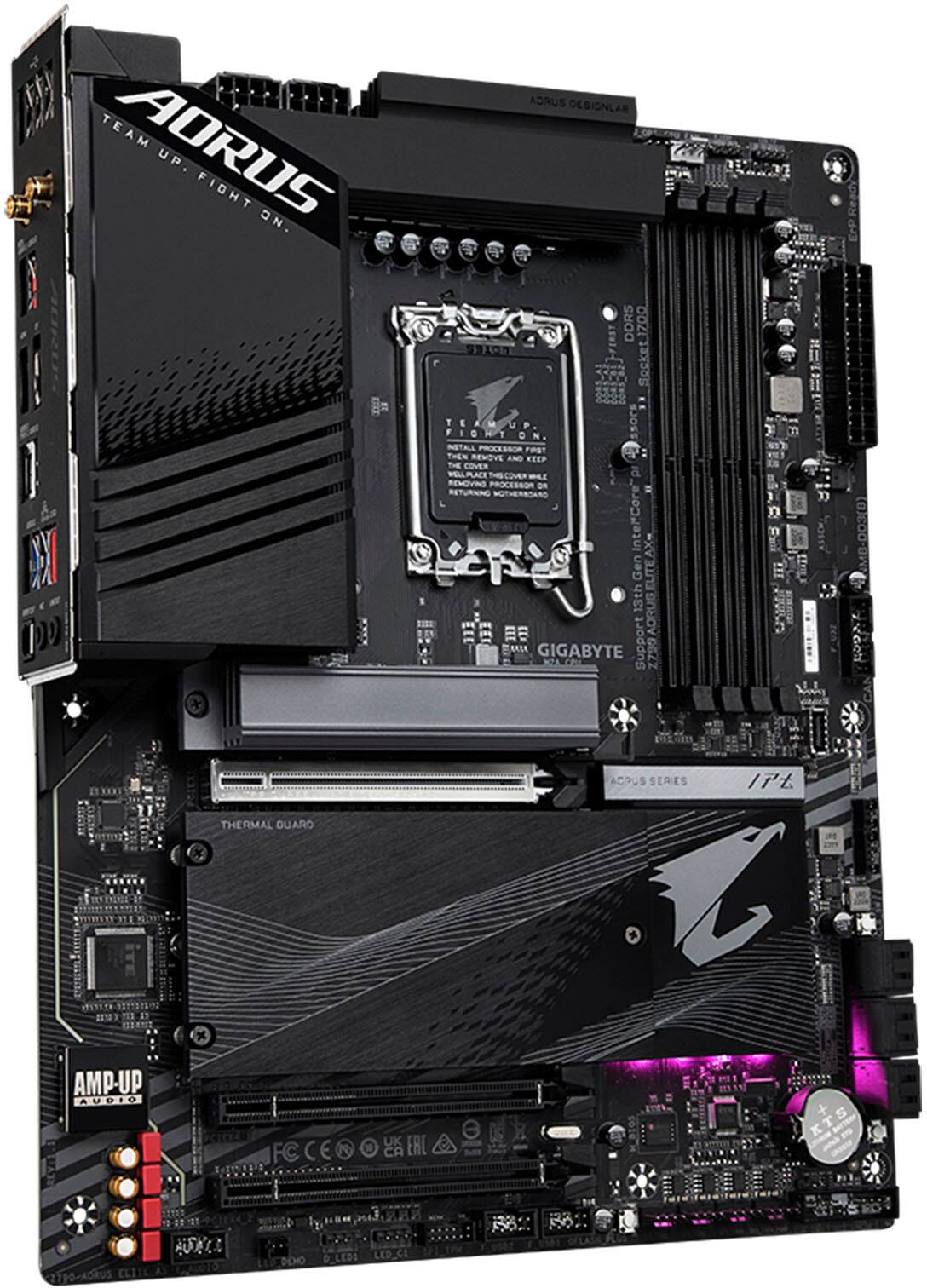 The image features a computer motherboard with a black and purple color scheme. The motherboard is made by Aorus, a sub-brand of Gigabyte. The motherboard is designed for gaming and overclocking, and it is equipped with a variety of ports and connectors. The image showcases the motherboard's backside, highlighting its internal components and design.