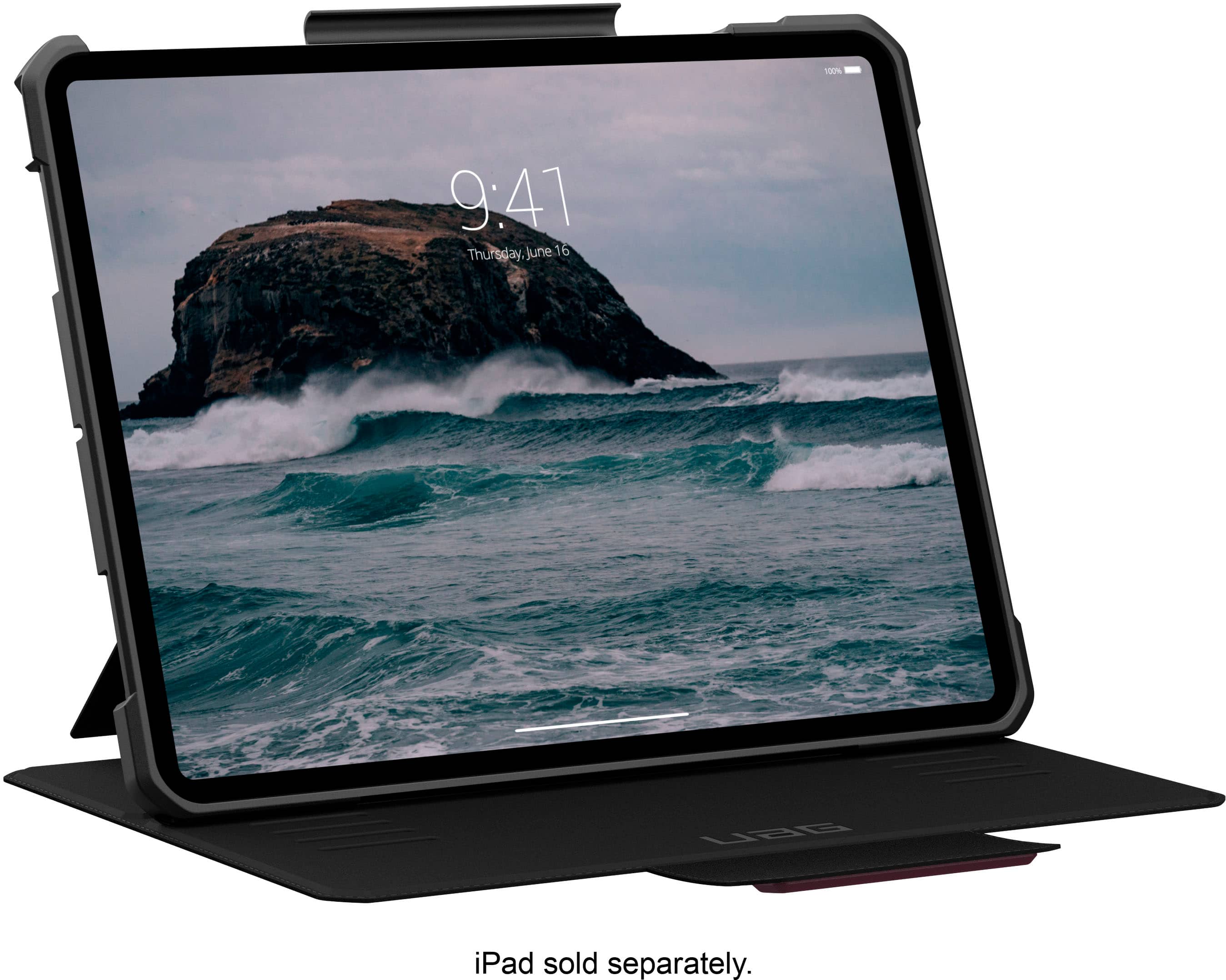 The image features a laptop computer with a large screen displaying a beautiful ocean scene. The time displayed on the screen is 9:41. The laptop is placed on a stand, which elevates the screen to a comfortable viewing angle. The scene is set against a backdrop of a mountain, creating a serene and picturesque environment.