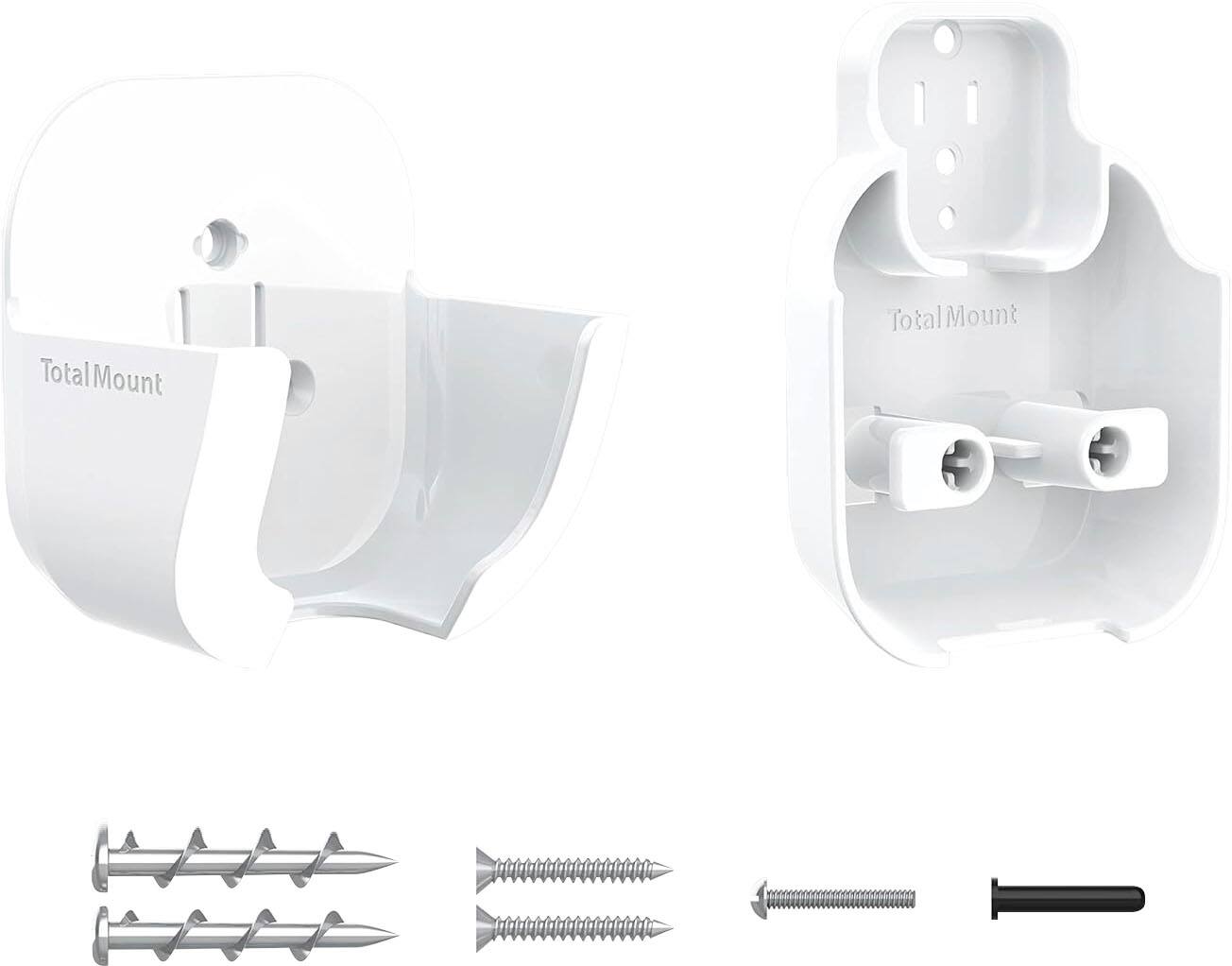 The image shows a white Total Mount device, which is a mounting system for various electronic devices. The device is designed to hold and secure a cell phone or other small gadgets. The mount is shown in two separate parts, with the top part being a white case and the bottom part being a white stand. The mounting system is accompanied by a set of screws and a screwdriver, which are used to secure the device to the mount. The Total Mount is a convenient and secure way to keep your electronic devices within reach and easily accessible.
