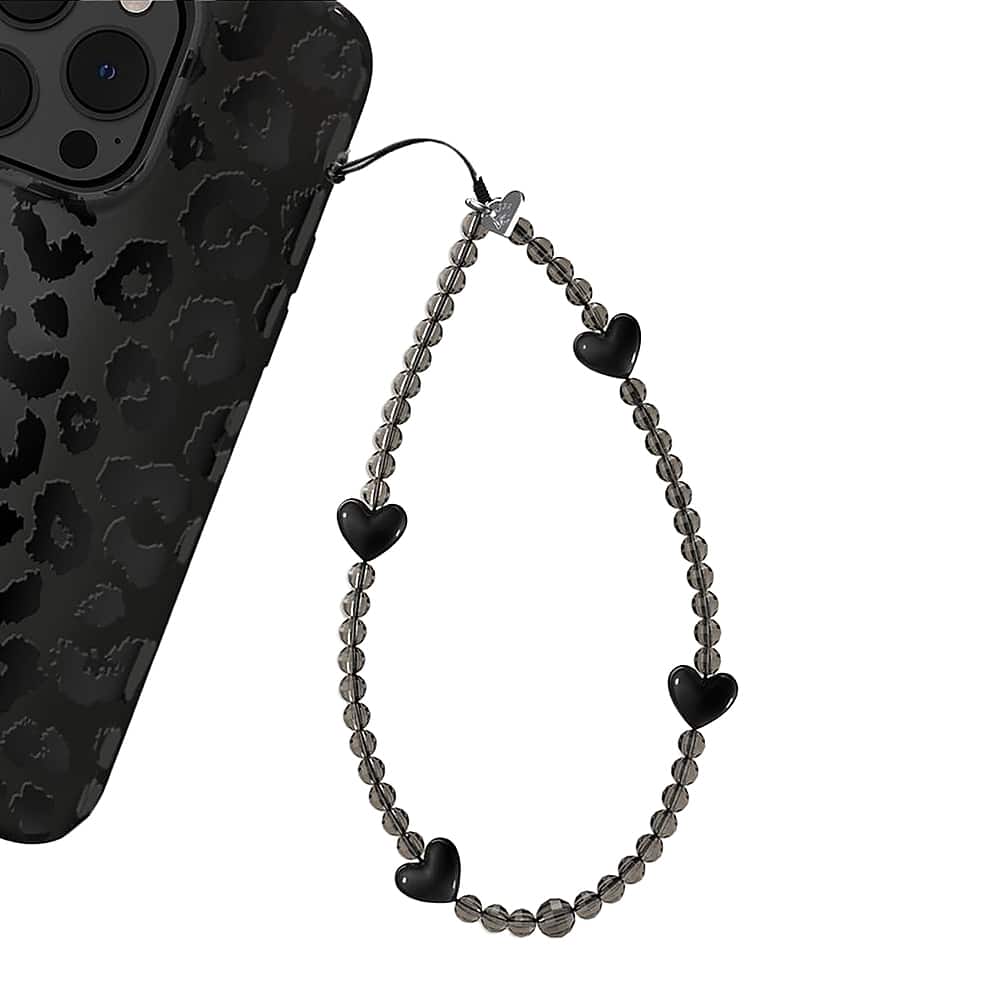 Angle. Velvet Caviar - Phone Charm - Black Heart.