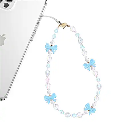 Angle. Velvet Caviar - Phone Charm - French Blue Bow.