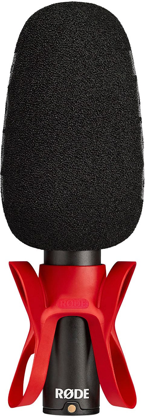 The image features a red and black microphone, which is a Rode NT-USB. The microphone is positioned against a white background, making it stand out prominently. The Rode NT-USB is a versatile and high-quality microphone that is suitable for various recording applications, such as podcasting, voice-over work, and video conferencing.