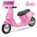 The image features a pink Barbie electric scooter, which is a ride-on toy for children. The scooter is designed with a pink color scheme and has a seat for the rider. The Barbie branding is visible on the scooter, making it a fun and stylish toy for young girls. The scooter is parked on a pink background, further emphasizing the Barbie theme.