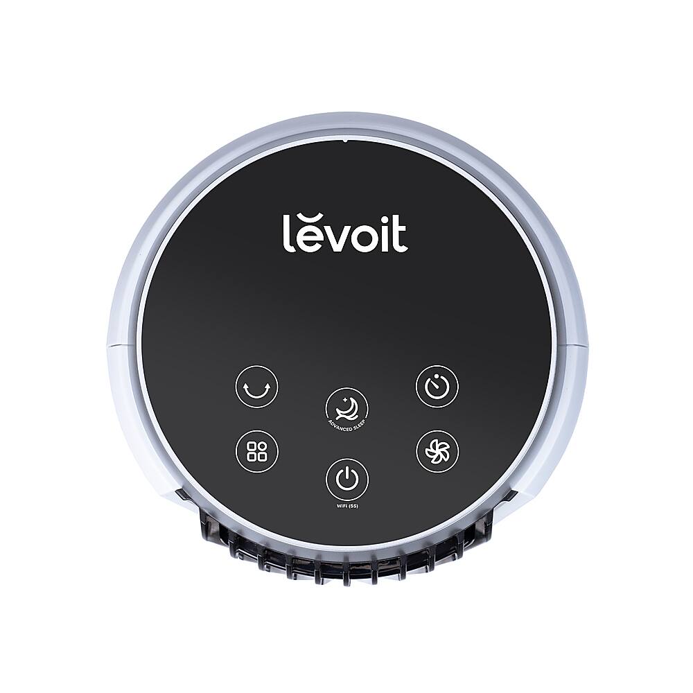 The image features a small, round device with a black and silver color scheme. The device has a control panel with buttons and a digital display. The device is likely a smart home appliance or a small robotic device. The text "levoit" is displayed prominently on the device, indicating its brand or manufacturer.