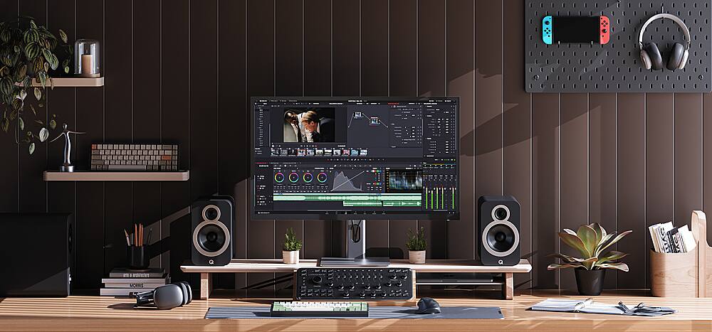 I have a computer desk with a monitor, keyboard, and mouse.