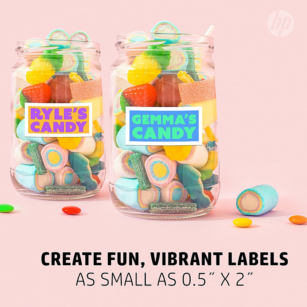 The image features two jars filled with colorful candy, such as gummy bears, and lollipops. The jars are labeled "Ryle's Candy" and "Gemma's Candy," indicating that they contain different types of candy. The candy is arranged in an appealing manner, making it look like a fun and vibrant display. The image suggests that these jars can be used to create fun, vibrant labels as small as 0.5" x 2" in size.